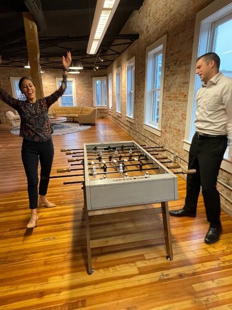 Steph winning foosball game